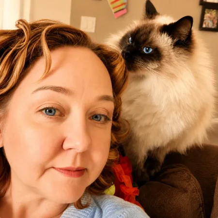 Sheila with her blue-eyed cat